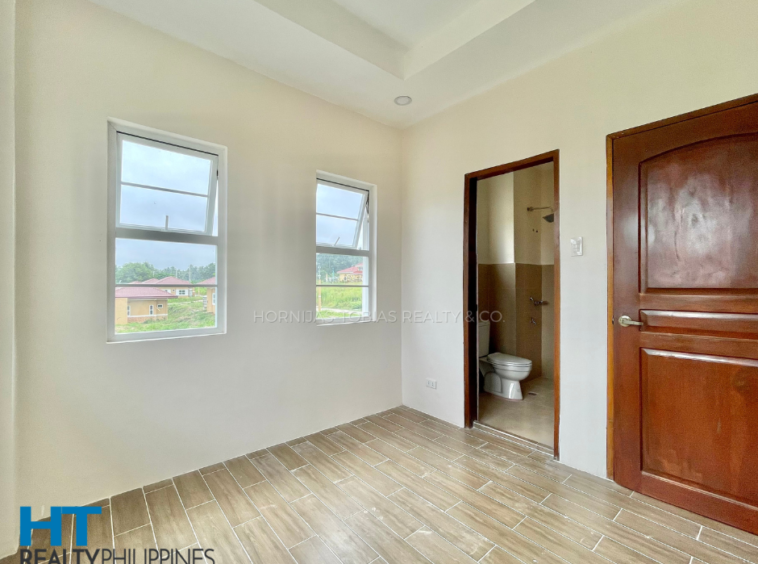 Loridana House Primary Bedroom - The Gardens at South Ridge Toril Davao City