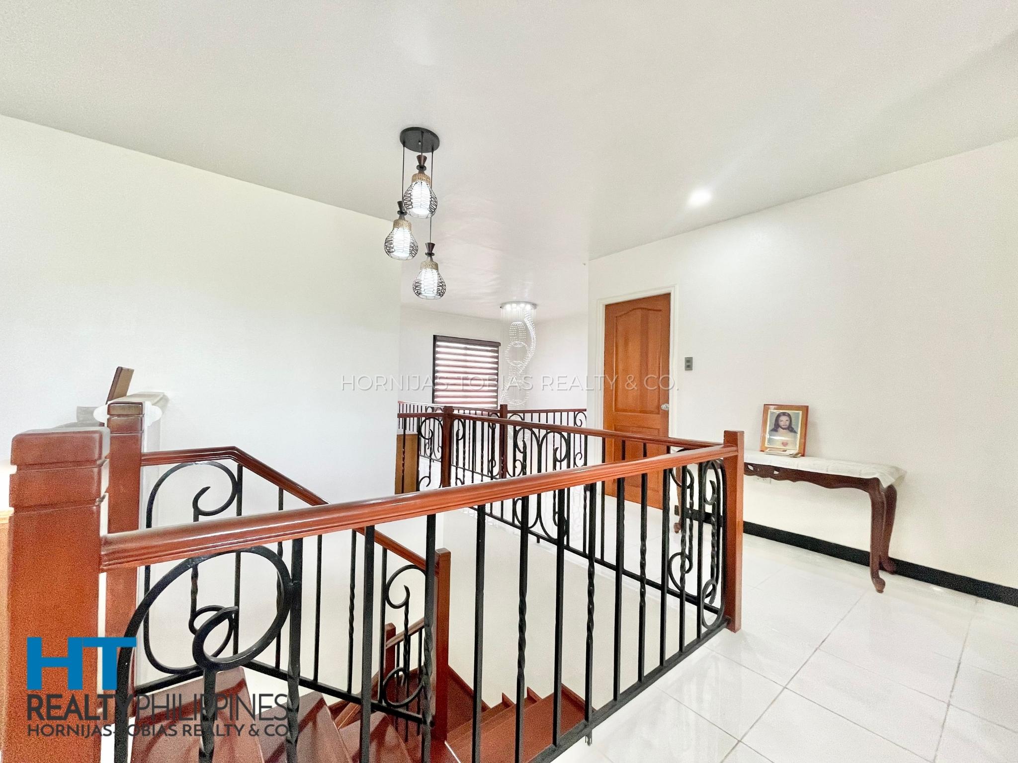 Western Style 6 Bedroom House Big Lot for Sale in South Pacific Golf and Leisure Estates - second floor stairs