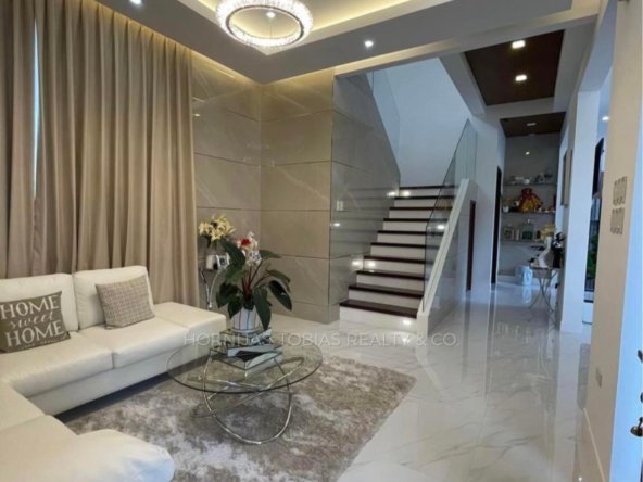 Living Area and Stairs - Fully Furnished 4 Bedroom House for Sale in Woodridge Park Maa Davao City