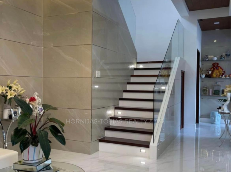 Stairs - Fully Furnished 4 Bedroom House for Sale in Woodridge Park Maa Davao City