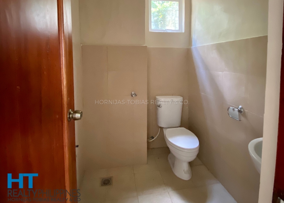 Powder room - Mediterranean-inspired 4 bedroom house for sale at The Gardens at Southridge, Davao City, Davao Region, Philippines