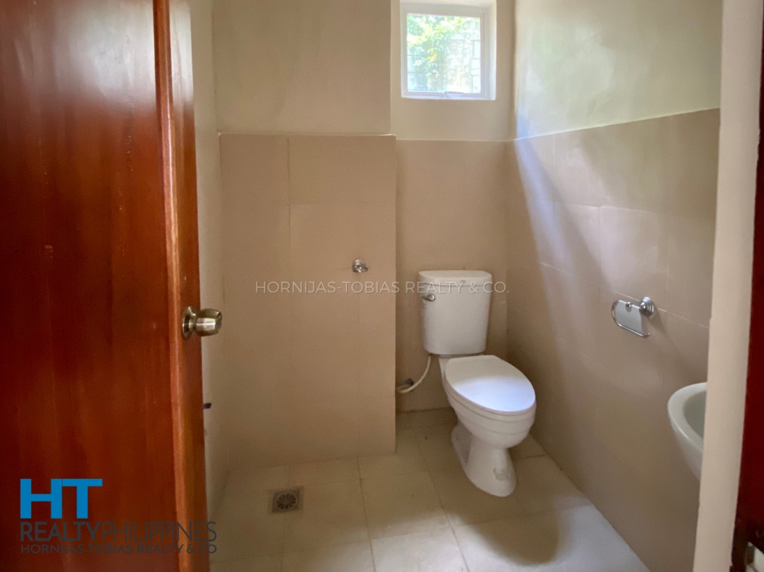 Powder room - Mediterranean-inspired 4 bedroom house for sale at The Gardens at Southridge, Davao City, Davao Region, Philippines