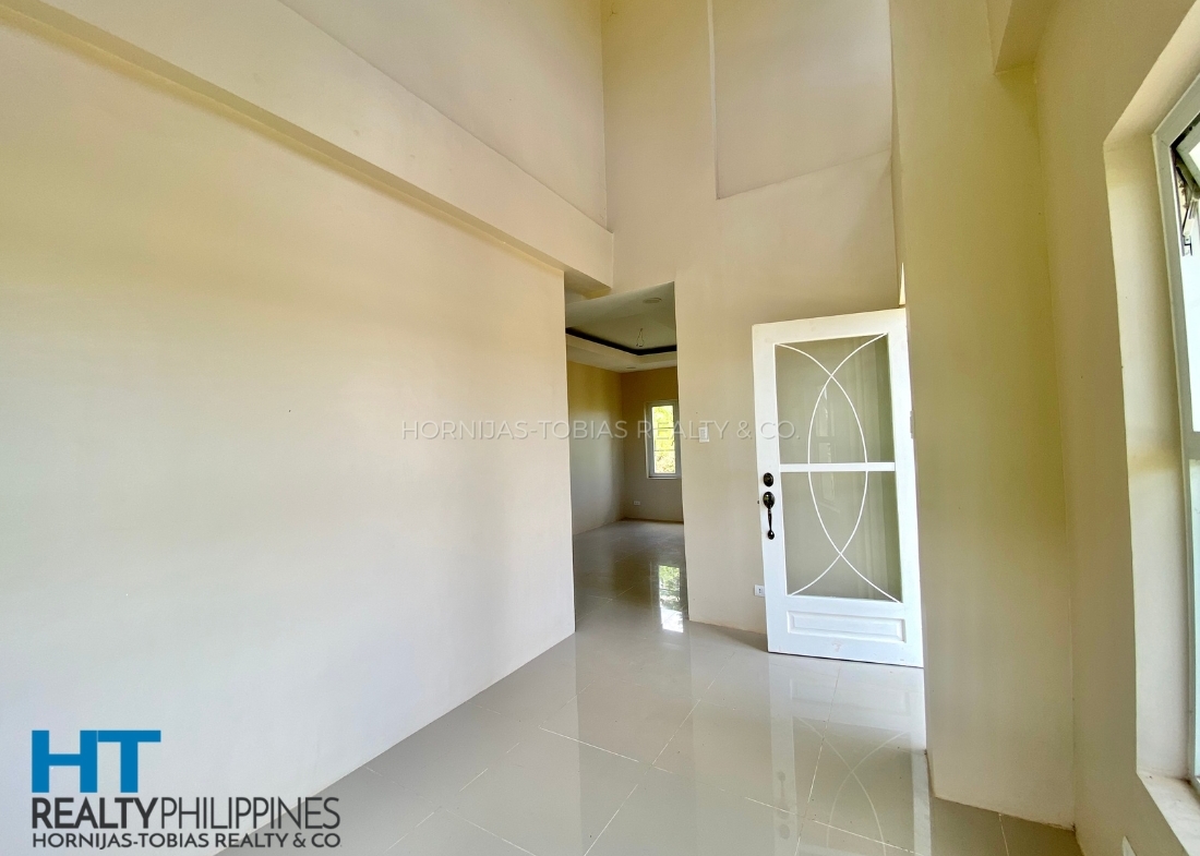 Living room - Mediterranean-inspired 4 bedroom house for sale at The Gardens at Southridge, Davao City, Davao Region, Philippines