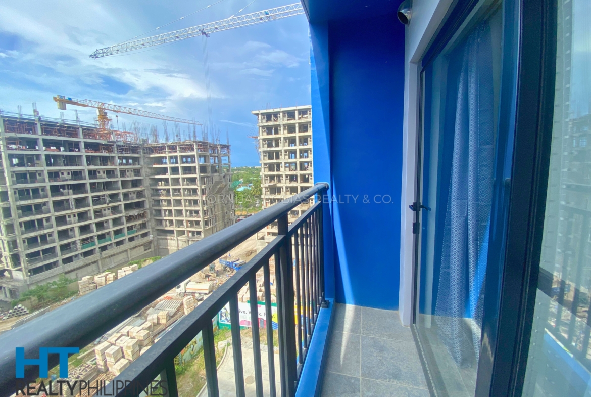 balcony facing amenities - Furnished studio condo for sale in Amani Grand City Gate, Buhangin-Cabantian-Indangan Rd, Buhangin, Davao City