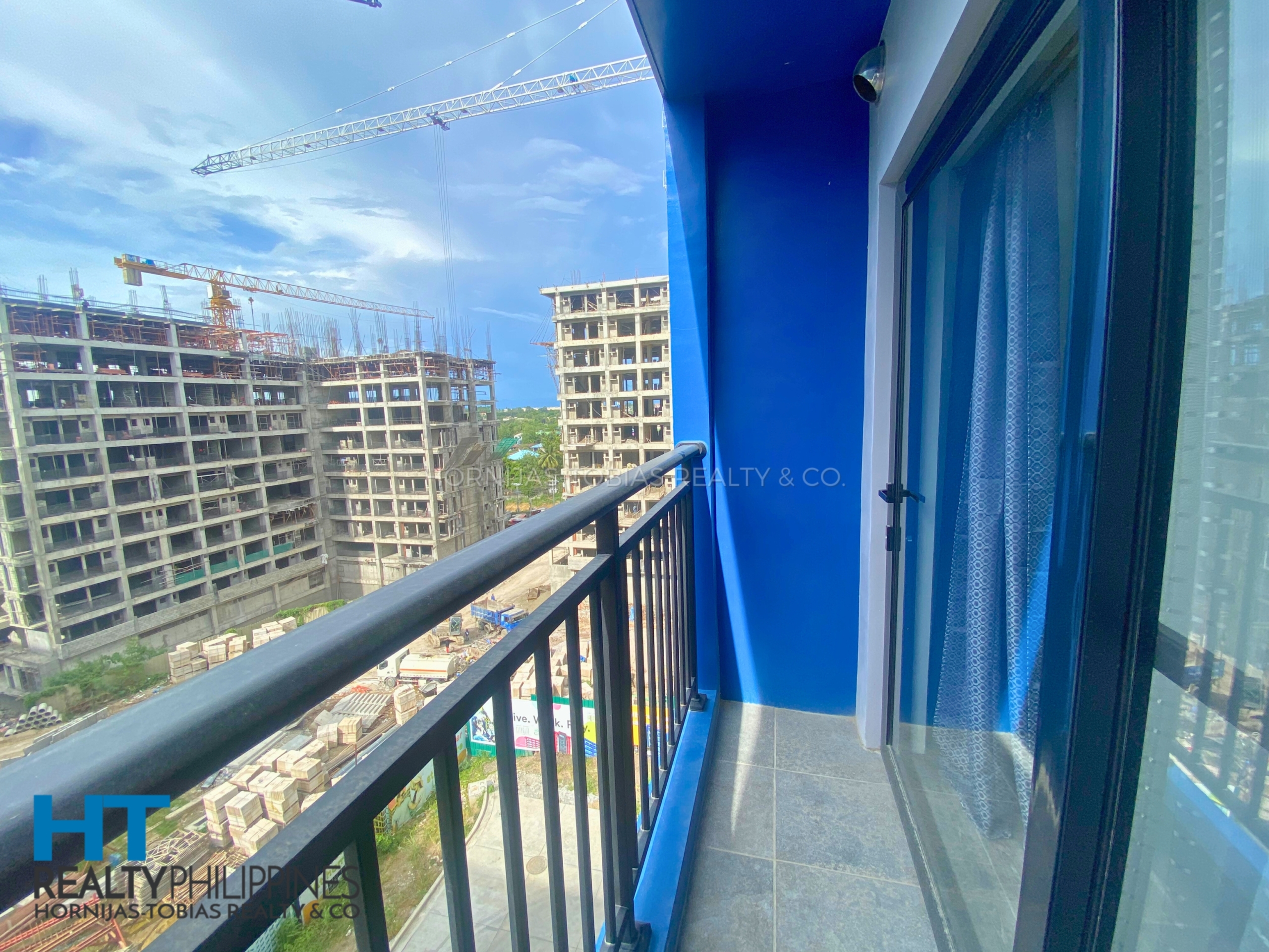 balcony facing amenities - Furnished studio condo for sale in Amani Grand City Gate, Buhangin-Cabantian-Indangan Rd, Buhangin, Davao City