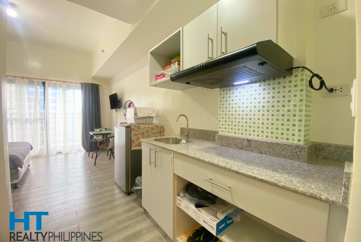 Kitchen - Furnished studio condo for sale in Amani Grand City Gate, Buhangin-Cabantian-Indangan Rd, Buhangin, Davao City