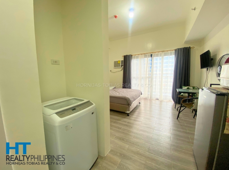 Laundry - Furnished studio condo for sale in Amani Grand City Gate, Buhangin-Cabantian-Indangan Rd, Buhangin, Davao City