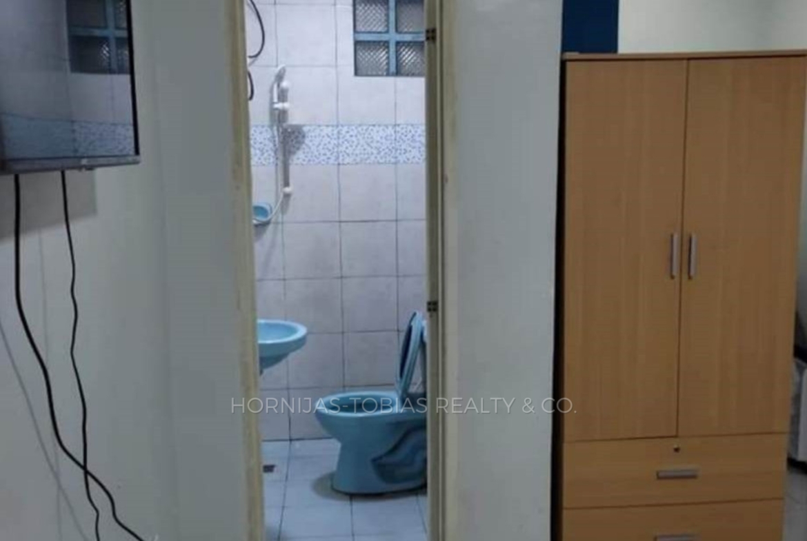 bathroom and cabinets - 12-door 4-floor income-generating apartment building for sale in Buhangin, Davao City