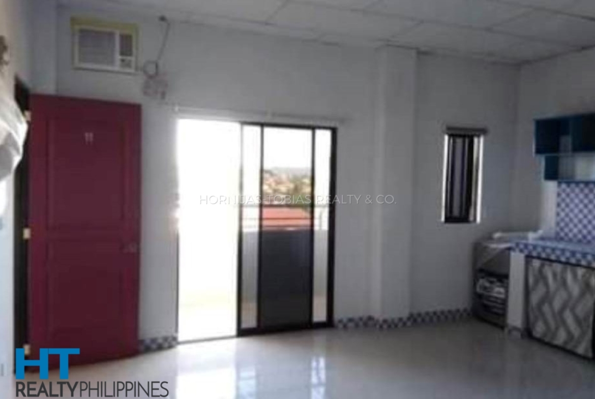 sliding glass doors - 12-door 4-floor income-generating apartment building for sale in Buhangin, Davao City
