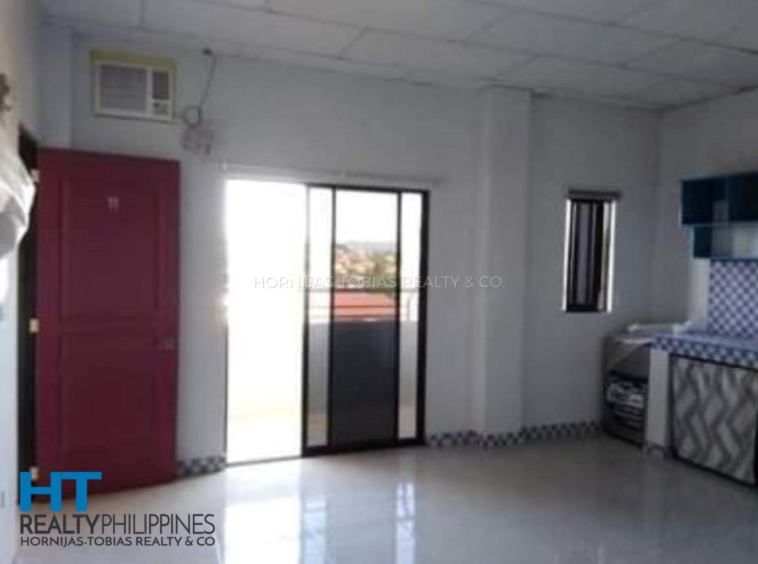 sliding glass doors - 12-door 4-floor income-generating apartment building for sale in Buhangin, Davao City