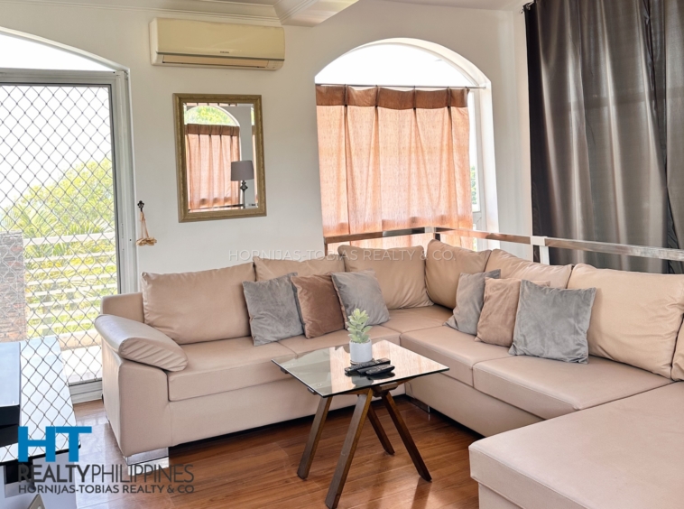 Family room on the second floor - Big house and lot for sale in Villa de Mercedes with 4 bedrooms and 2 parking garage. Big lot.