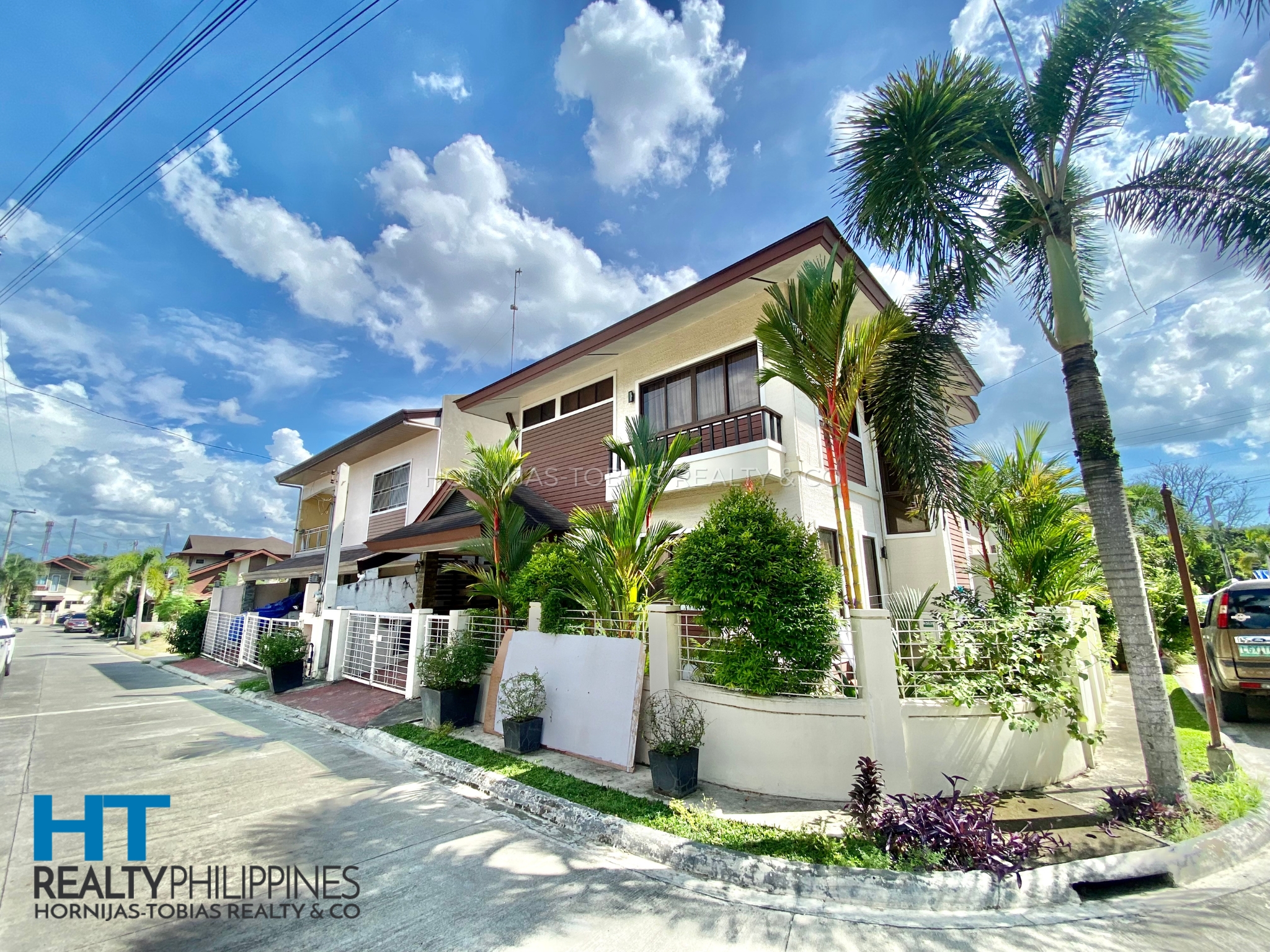 Side - Corner house and lot with 4 bedrooms and 3 bathrooms furnished for sale in Twin Palms, Ma-a, Davao City